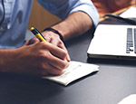 A person working in an office. Credit: Pixabay