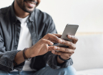 Man on smart phone. Credit: iStock.com