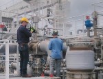 Dr Balcombe taking measurements onboard the Gaslog Galveston