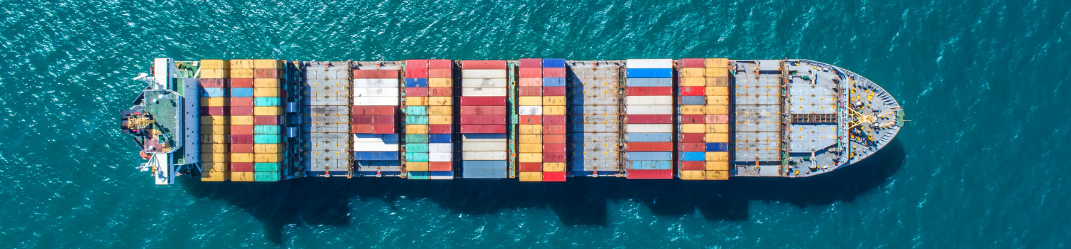 Ariel View of Ship with Multicoloured Shipping Containers