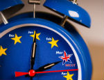 Alarm clock with the colours of the EU flag and one UK star representing the countdown to Brexit.