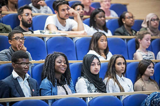 Queen Mary University of London students in a lecture theatre