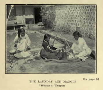 Photograph from Horace Allen Things Korean (1908) showing women sitting on the floor doing laundry using a mangle