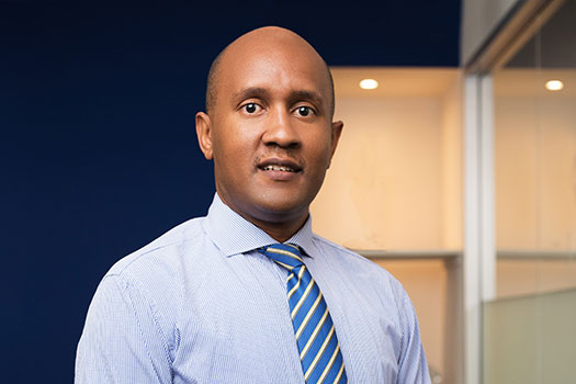Joseph Gitau Mburu in a shirt and tie