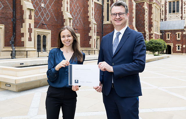 Isabel Vanhaeverbeke receiving the White & Black Queen Mary LLM essay prize in European Law of Patents from Duncan Matthews.