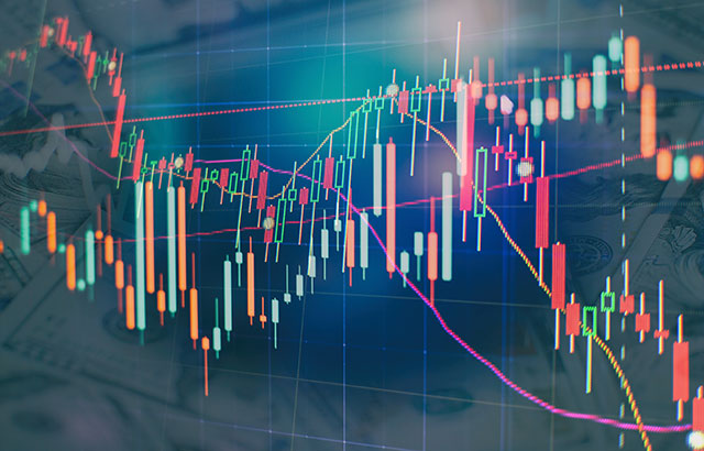 Financial instruments with various type of indicators including volume analysis for professional technical analysis on the monitor of a computer.