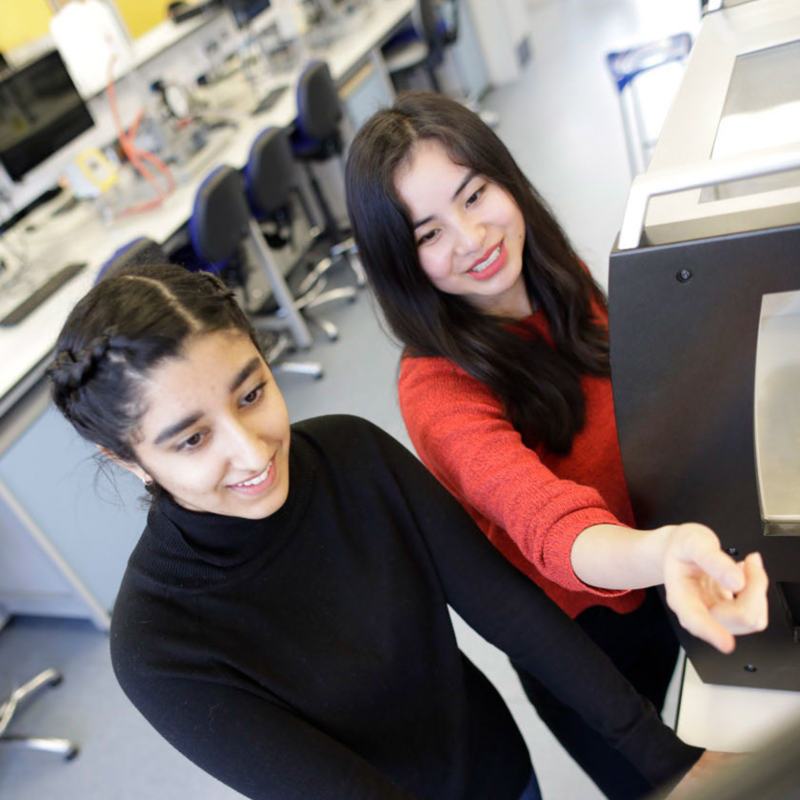 Two students working in the lab at Queen Mary University