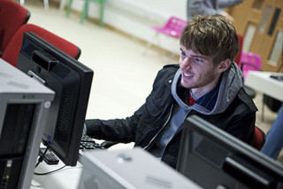 Student studying at a computer