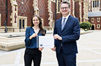 Isabel Vanhaeverbeke receiving the White & Black Queen Mary LLM essay prize in European Law of Patents from Duncan Matthews.