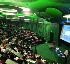 Audience and stage in conference hall