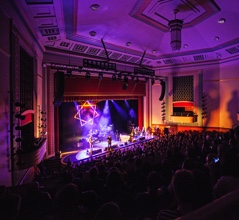 View of the stage in darkened theatre